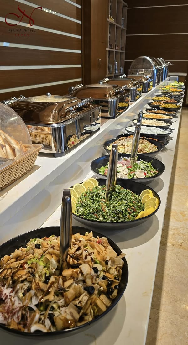 A beautifully presented bufae with with all kinds of foods and drinks